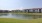 a body of water with buildings around it